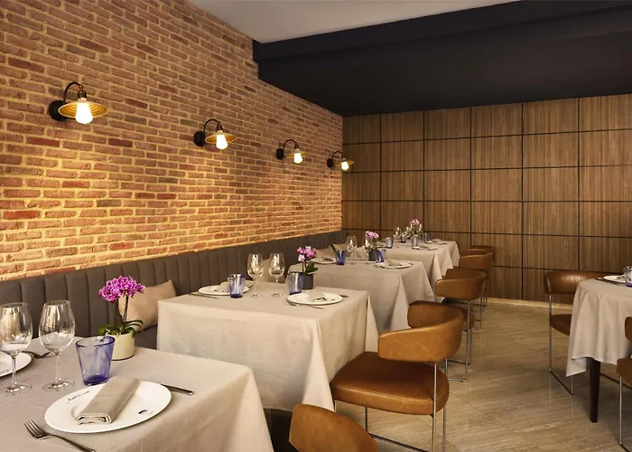 إن إتش ستاديوم فندق 4*